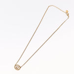 Christian Dior Vintage Logo Round Pendant Necklace Metal and Crystals - image 2